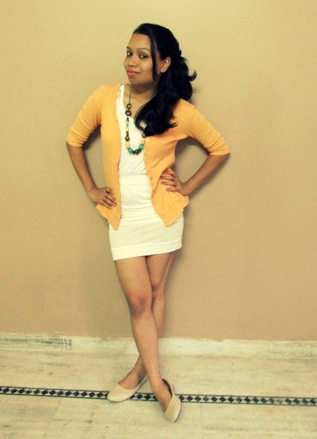 White Mini Skirt with Pastel Orange Shrug Outfit look 1