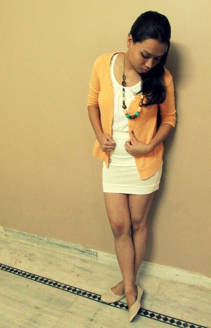 White Mini Skirt with Pastel Orange Shrug Outfit look 3